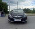Черный Опель Инсигния, объемом двигателя 2 л и пробегом 260 тыс. км за 10000 $, фото 1 на Automoto.ua
