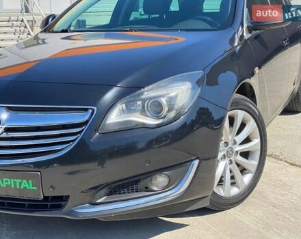 Чорний Опель Інсігнія, об'ємом двигуна 1.96 л та пробігом 218 тис. км за 9490 $, фото 1 на Automoto.ua