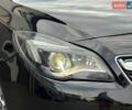 Чорний Опель Інсігнія, об'ємом двигуна 2 л та пробігом 177 тис. км за 8299 $, фото 2 на Automoto.ua