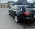 Черный Опель Инсигния, объемом двигателя 2 л и пробегом 260 тыс. км за 10000 $, фото 3 на Automoto.ua