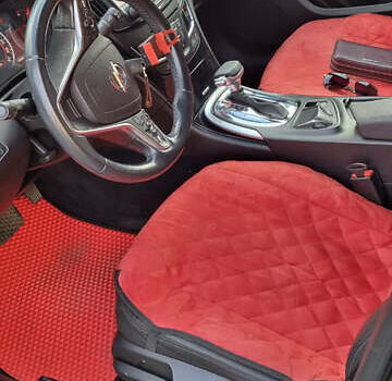 Черный Опель Инсигния, объемом двигателя 1.96 л и пробегом 235 тыс. км за 11200 $, фото 7 на Automoto.ua