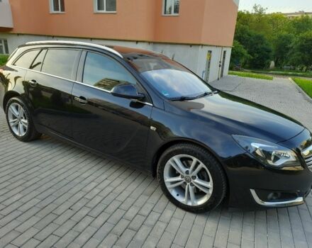 Чорний Опель Інсігнія, об'ємом двигуна 1.96 л та пробігом 219 тис. км за 10800 $, фото 2 на Automoto.ua