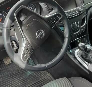 Чорний Опель Інсігнія, об'ємом двигуна 2 л та пробігом 240 тис. км за 10100 $, фото 2 на Automoto.ua