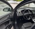 Черный Опель Инсигния, объемом двигателя 2 л и пробегом 240 тыс. км за 8500 $, фото 7 на Automoto.ua