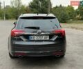 Черный Опель Инсигния, объемом двигателя 1.96 л и пробегом 259 тыс. км за 10400 $, фото 4 на Automoto.ua