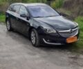 Чорний Опель Інсігнія, об'ємом двигуна 2 л та пробігом 240 тис. км за 10500 $, фото 1 на Automoto.ua