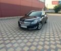 Чорний Опель Інсігнія, об'ємом двигуна 1.96 л та пробігом 350 тис. км за 9000 $, фото 1 на Automoto.ua