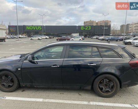 Чорний Опель Інсігнія, об'ємом двигуна 1.96 л та пробігом 242 тис. км за 10600 $, фото 2 на Automoto.ua