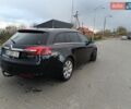 Чорний Опель Інсігнія, об'ємом двигуна 1.96 л та пробігом 289 тис. км за 7999 $, фото 18 на Automoto.ua