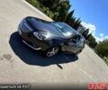 Черный Опель Инсигния, объемом двигателя 2 л и пробегом 340 тыс. км за 8500 $, фото 1 на Automoto.ua