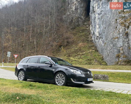 Чорний Опель Інсігнія, об'ємом двигуна 1.96 л та пробігом 170 тис. км за 11900 $, фото 1 на Automoto.ua