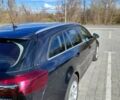 Чорний Опель Інсігнія, об'ємом двигуна 2 л та пробігом 234 тис. км за 8700 $, фото 4 на Automoto.ua