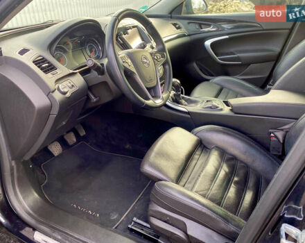 Чорний Опель Інсігнія, об'ємом двигуна 1.96 л та пробігом 170 тис. км за 11900 $, фото 6 на Automoto.ua