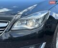 Черный Опель Инсигния, объемом двигателя 1.96 л и пробегом 177 тыс. км за 9990 $, фото 7 на Automoto.ua