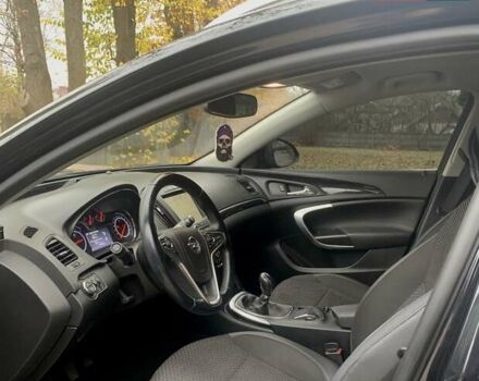 Чорний Опель Інсігнія, об'ємом двигуна 1.96 л та пробігом 193 тис. км за 10700 $, фото 9 на Automoto.ua