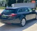Чорний Опель Інсігнія, об'ємом двигуна 1.96 л та пробігом 218 тис. км за 9490 $, фото 6 на Automoto.ua
