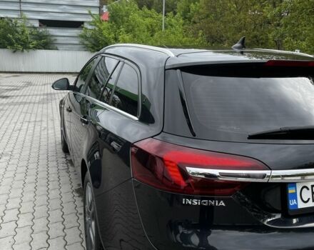 Черный Опель Инсигния, объемом двигателя 2 л и пробегом 240 тыс. км за 8500 $, фото 4 на Automoto.ua