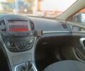 Чорний Опель Інсігнія, об'ємом двигуна 1.96 л та пробігом 289 тис. км за 7500 $, фото 35 на Automoto.ua