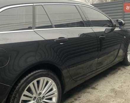 Чорний Опель Інсігнія, об'ємом двигуна 1.96 л та пробігом 193 тис. км за 10700 $, фото 4 на Automoto.ua