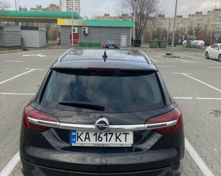 Чорний Опель Інсігнія, об'ємом двигуна 1.96 л та пробігом 242 тис. км за 10600 $, фото 4 на Automoto.ua