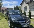 Чорний Опель Інсігнія, об'ємом двигуна 2 л та пробігом 223 тис. км за 9200 $, фото 1 на Automoto.ua