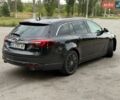 Черный Опель Инсигния, объемом двигателя 1.96 л и пробегом 259 тыс. км за 10400 $, фото 5 на Automoto.ua