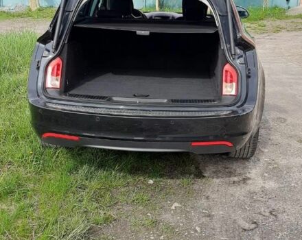Чорний Опель Інсігнія, об'ємом двигуна 2 л та пробігом 240 тис. км за 10500 $, фото 6 на Automoto.ua