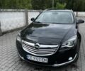 Черный Опель Инсигния, объемом двигателя 2 л и пробегом 240 тыс. км за 8500 $, фото 1 на Automoto.ua