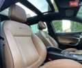 Черный Опель Инсигния, объемом двигателя 2 л и пробегом 179 тыс. км за 12500 $, фото 1 на Automoto.ua