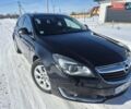 Чорний Опель Інсігнія, об'ємом двигуна 2 л та пробігом 320 тис. км за 9500 $, фото 4 на Automoto.ua