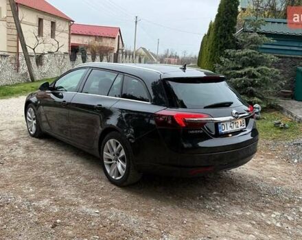 Черный Опель Инсигния, объемом двигателя 2 л и пробегом 270 тыс. км за 9500 $, фото 1 на Automoto.ua