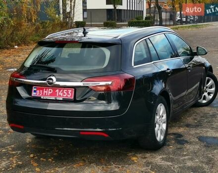 Чорний Опель Інсігнія, об'ємом двигуна 1.96 л та пробігом 205 тис. км за 12999 $, фото 5 на Automoto.ua