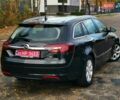 Чорний Опель Інсігнія, об'ємом двигуна 1.96 л та пробігом 205 тис. км за 12999 $, фото 5 на Automoto.ua