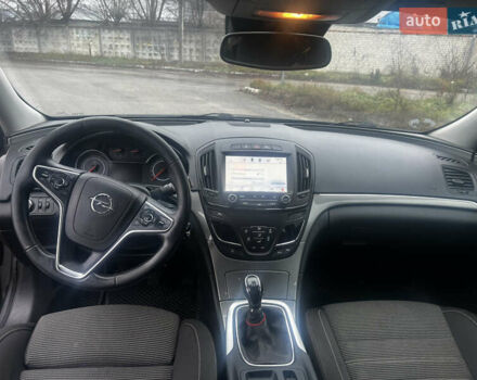 Чорний Опель Інсігнія, об'ємом двигуна 1.6 л та пробігом 210 тис. км за 8400 $, фото 5 на Automoto.ua