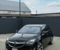 Черный Опель Инсигния, объемом двигателя 2 л и пробегом 224 тыс. км за 12500 $, фото 1 на Automoto.ua