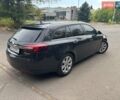 Чорний Опель Інсігнія, об'ємом двигуна 2 л та пробігом 240 тис. км за 8500 $, фото 6 на Automoto.ua