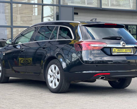 Чорний Опель Інсігнія, об'ємом двигуна 2 л та пробігом 220 тис. км за 12300 $, фото 3 на Automoto.ua