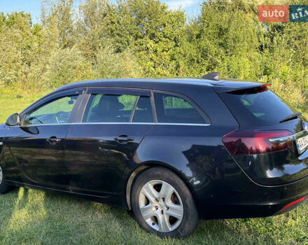 Чорний Опель Інсігнія, об'ємом двигуна 1.6 л та пробігом 208 тис. км за 8999 $, фото 2 на Automoto.ua