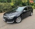 Черный Опель Инсигния, объемом двигателя 2 л и пробегом 240 тыс. км за 8500 $, фото 1 на Automoto.ua