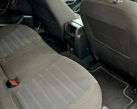 Чорний Опель Інсігнія, об'ємом двигуна 1.6 л та пробігом 304 тис. км за 9100 $, фото 9 на Automoto.ua