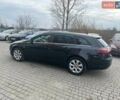 Чорний Опель Інсігнія, об'ємом двигуна 1.6 л та пробігом 274 тис. км за 10500 $, фото 4 на Automoto.ua