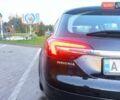 Чорний Опель Інсігнія, об'ємом двигуна 2 л та пробігом 233 тис. км за 11000 $, фото 29 на Automoto.ua