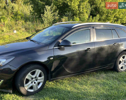 Чорний Опель Інсігнія, об'ємом двигуна 1.6 л та пробігом 208 тис. км за 8999 $, фото 1 на Automoto.ua