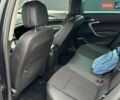 Черный Опель Инсигния, объемом двигателя 1.96 л и пробегом 174 тыс. км за 11450 $, фото 29 на Automoto.ua