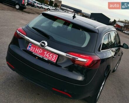 Чорний Опель Інсігнія, об'ємом двигуна 1.96 л та пробігом 205 тис. км за 12999 $, фото 10 на Automoto.ua
