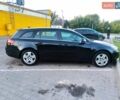 Чорний Опель Інсігнія, об'ємом двигуна 2 л та пробігом 233 тис. км за 11000 $, фото 10 на Automoto.ua