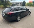 Черный Опель Инсигния, объемом двигателя 2 л и пробегом 240 тыс. км за 8990 $, фото 6 на Automoto.ua