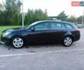 Чорний Опель Інсігнія, об'ємом двигуна 2 л та пробігом 233 тис. км за 11000 $, фото 24 на Automoto.ua