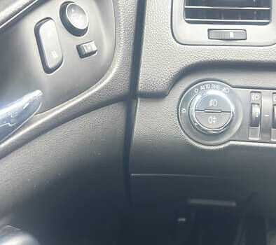 Чорний Опель Інсігнія, об'ємом двигуна 1.6 л та пробігом 210 тис. км за 8400 $, фото 9 на Automoto.ua