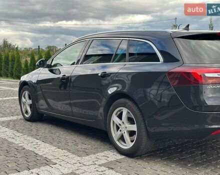 Чорний Опель Інсігнія, об'ємом двигуна 1.96 л та пробігом 250 тис. км за 10500 $, фото 6 на Automoto.ua